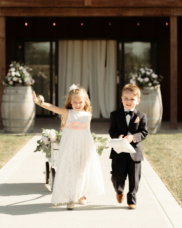 flowergirl and pageboy at wedding venue