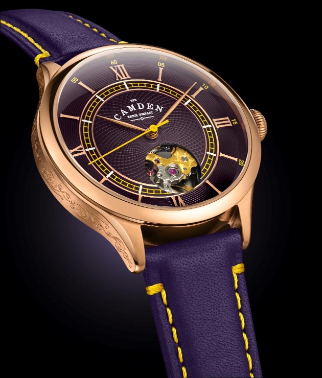 A purple and gold watch